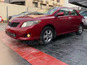 Toyota Corolla LE 4dr Sedan (1.8L 4cyl 4A) 2010 Red