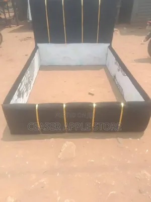 Luxury Black Upholstered Bed Frame With Gold Accents