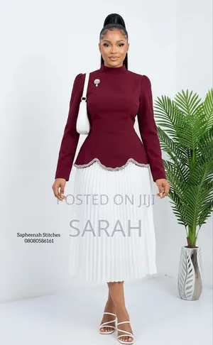 Scalloped Peplum Top and Pleated Skirt Set