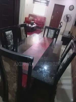 Dining Table With Glass Top and Six Chairs