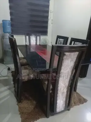 Dining Table With Glass Top and Six Chairs