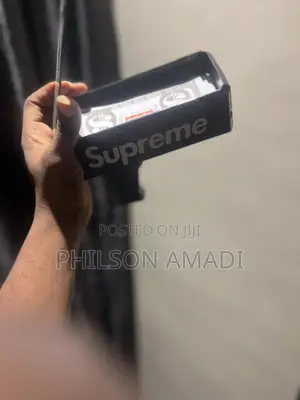 Money Gun With Fake $100 Note