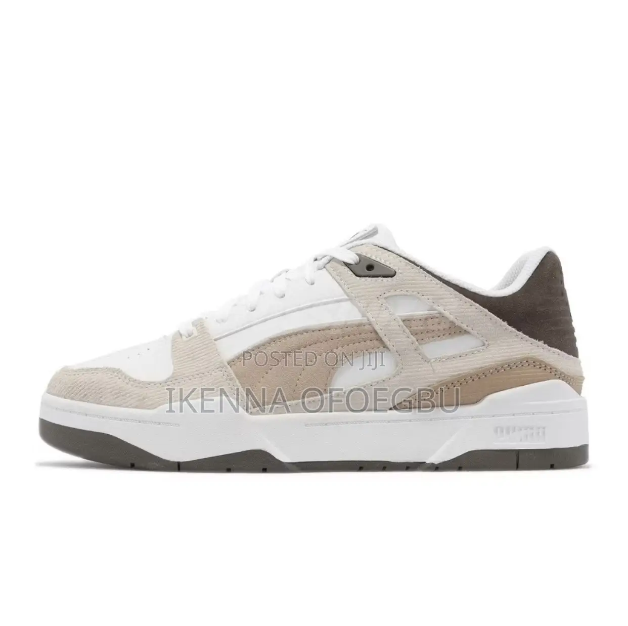 White and Brown Puma Slipstream