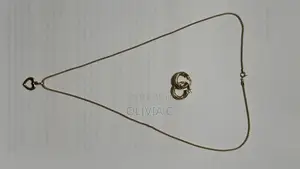 18 Karat Gold Earrings and Necklace With Pendant