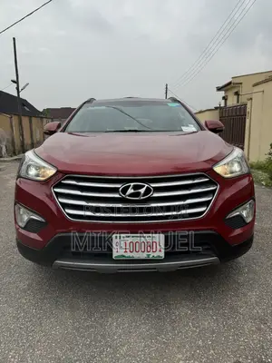 Hyundai Santa Fe Limited 4dr SUV AWD (3.3L 6cyl 6A) 2015 Red