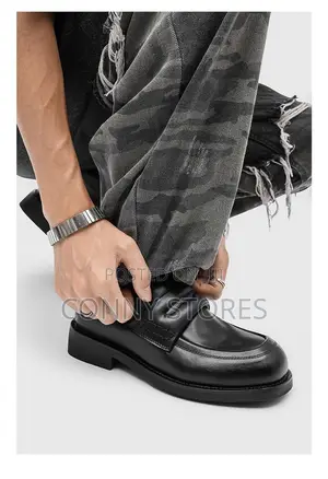Cop the Bold Cut-Out Bridge Loafers in Black