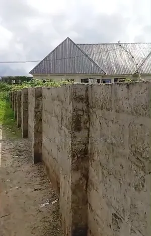Dry Table Land of 120 by 119 for Sale Ay Uwagba After Osubi