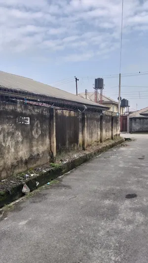 For Sale : Fenced 650 SQMTRS With Structures at Independence Layout.
