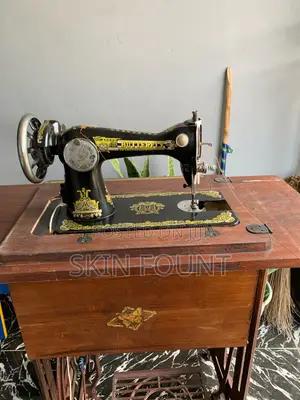 Sewing Machine With Electric Motor