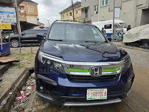 Honda Pilot Touring 4dr SUV 4WD (3.5L 6cyl 9A) 2016 Blue
