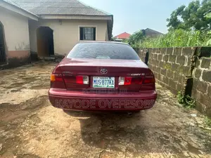 Toyota Camry LE 4dr Sedan (2.4L 4cyl 5M) 2002 Burgundy