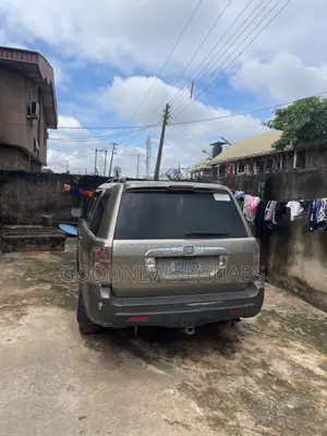 Honda Pilot LX 4x4 (3.5L 6cyl 5A) 2007 Gold