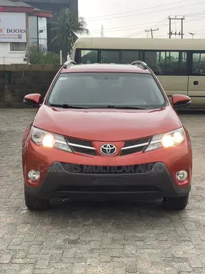 Toyota RAV4 XLE 4dr SUV AWD (2.5L 4cyl 6A) 2015 Orange