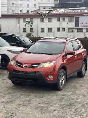 Toyota RAV4 XLE 4dr SUV AWD (2.5L 4cyl 6A) 2015 Orange