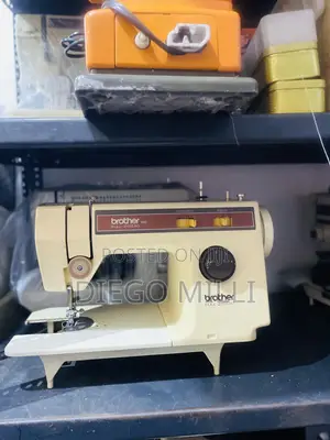 Electric And Manual Sewing Machine
