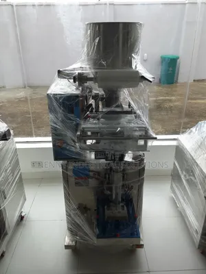 1kg Granule Packaging Machine With Auto Loader and Conveyor