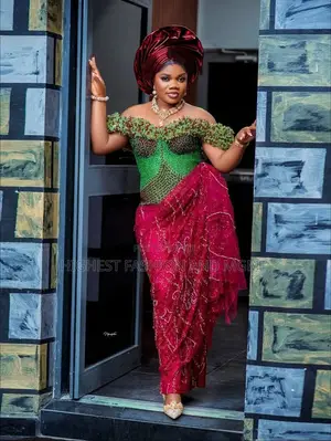 Off-Shoulder Emerald Green Embellished Blouse and Magenta Silk Wrapper