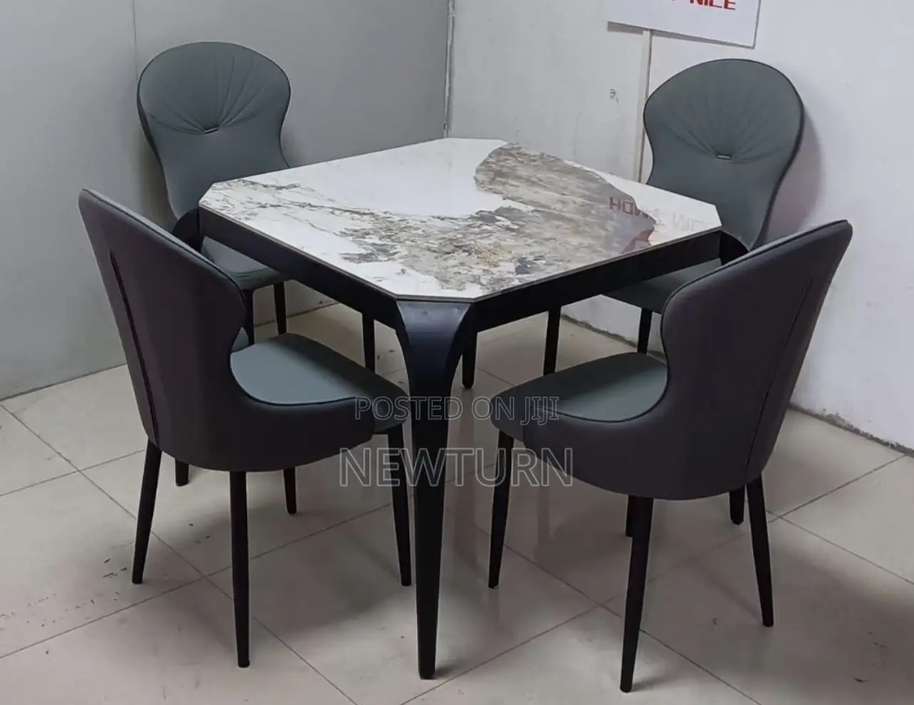 Four Seaters Marble Dining Set.