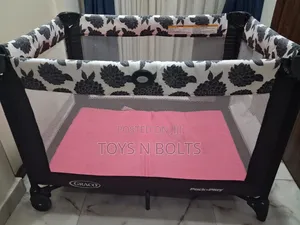 Graco Pack N Play Pink White and Black