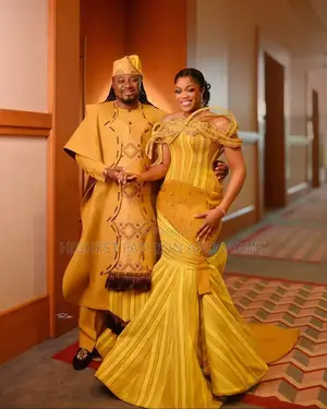 Luxury Mustard Yellow Sculpted Halo-Neck Aso Oke Mermaid Gown