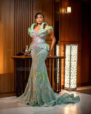 Elite Mint Green Leaf-Embroidered Mermaid Gown With Beaded Collar