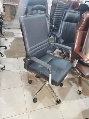 • Executive Office Chair - Swivel, Height Adjustable, Black Leather