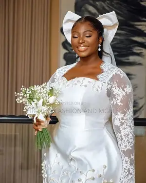Luxury Structured Pearl-Fringed Mini Gown With Statement Bow Veil