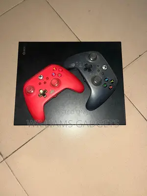 Xbox One X 1tb, Two Wired Pad
