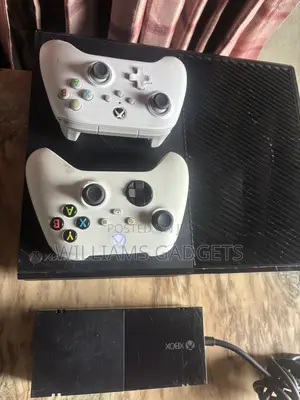 Xbox One 1tb, 2 Controllers (1 Wired 1 Wireless), and 20 Games