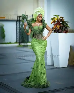 Elite Lime Green Beaded Corset Feather Gown