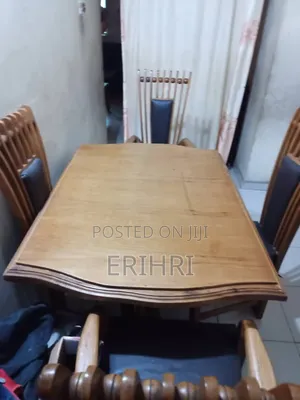 A Dinning Table With Chairs