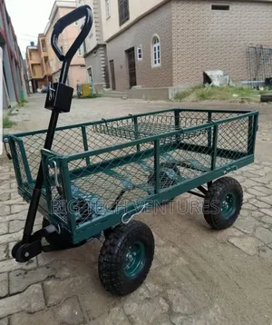 Green Steel Mesh Garden Trolley Features Removable Sides and Pneumatic
