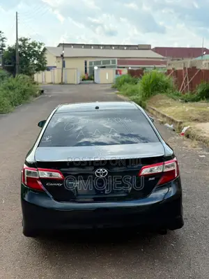 Toyota Camry SE Sport 4dr Sedan w/Prod. End 11/13 (2.5L 4cyl 6A) 2014