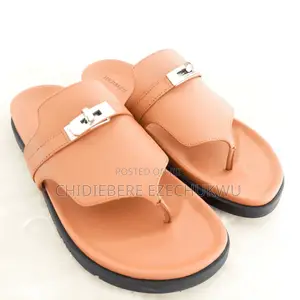 Flat Slide Sandal Featuring an Accent Lock