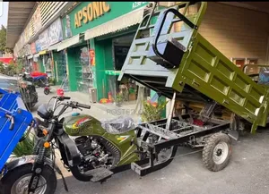 Olive Green Cargo Tricycle Features a Hydraulic Dump Bed and a 200cc
