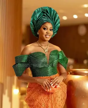 Structured Emerald Shimmer Bridal Top With Embellished Orange Wrappe