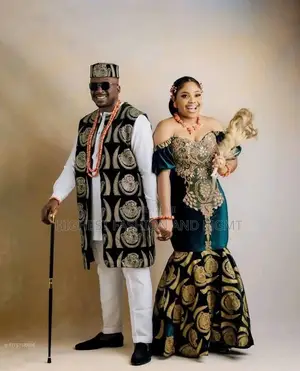 Off-Shoulder Emerald Velvet Bridal Gown With Gold Lion Head Appliqué