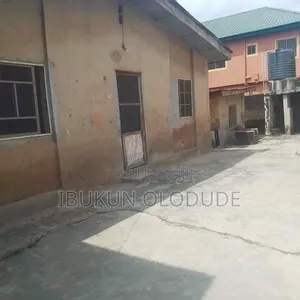 Plot of Land With Bungalows Inside Est at Alagbole for Sale