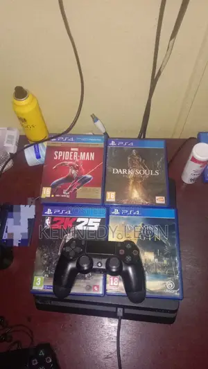 Playstation 4 Slim 1tb + 4 Games and 1 Controller (Used)