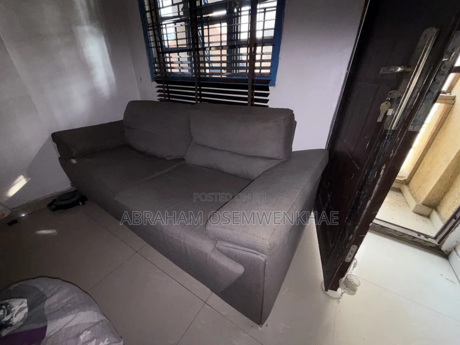 Large Gray Colored 2-Seater Sofa