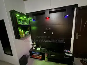 Brown Colored HDF Tv Console Setup and Mini Bar Shelf