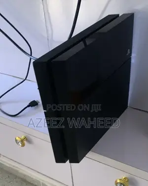 Sony Ps4 Console With 8 Games Installed