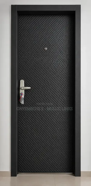 Black Steel Security Door With a Quilted Diamond Pattern Design