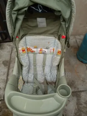 Green Graco Baby Stroller