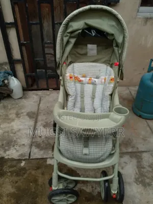 Green Graco Baby Stroller