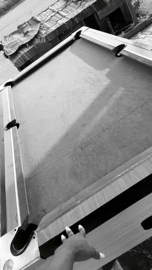 A Standard Snooker Table but a Wooden Board Face