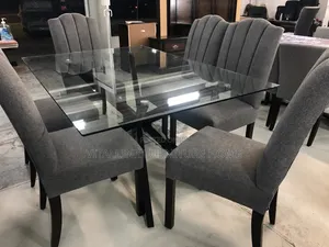 Modern 6-Seater Glass Dining Set With Grey Channel-Tufted Chairs