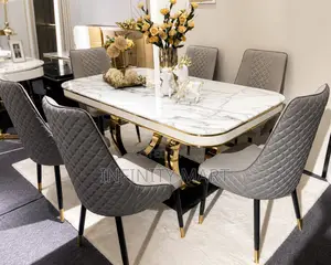 Glossy 6 Seater Marble Dining Set.