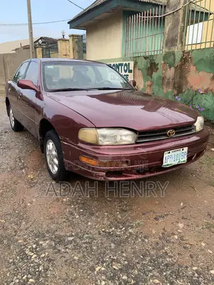 Toyota Camry LE Sedan 1995 Red