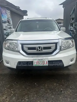 Honda Pilot Touring w/RES/Navi 4WD (3.5L 6cyl 5A) 2011 Off white